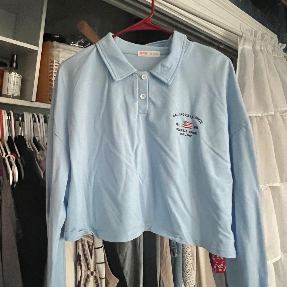 Light blue long sleeved crop top polo